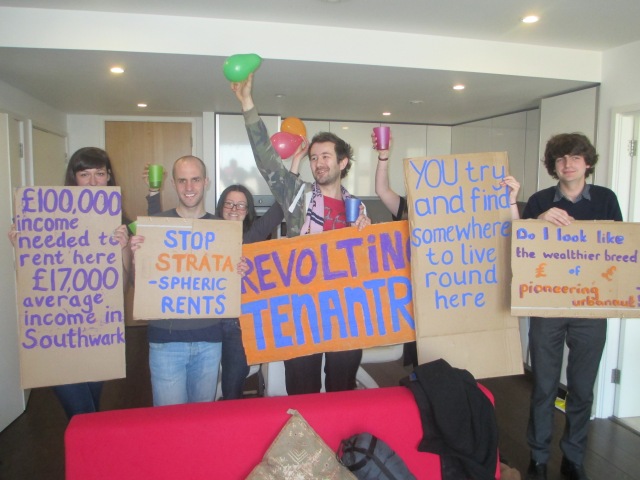 Photo of renters with placards and balloons